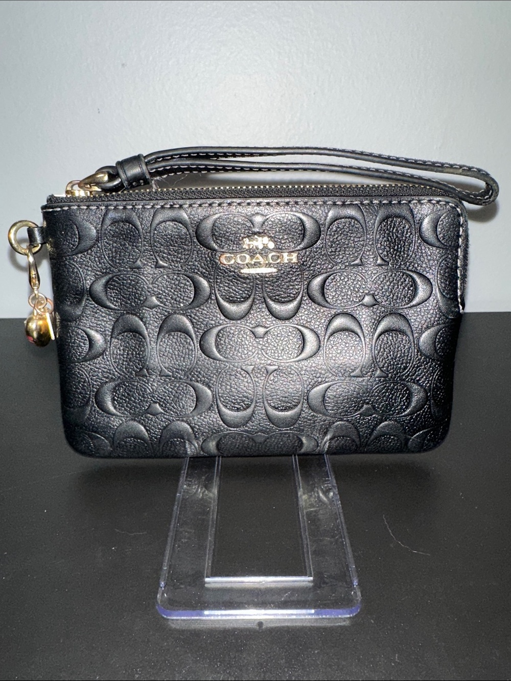 Coach Black Embossed Signature Wristlet with Gold Accent & Charm. Perfect